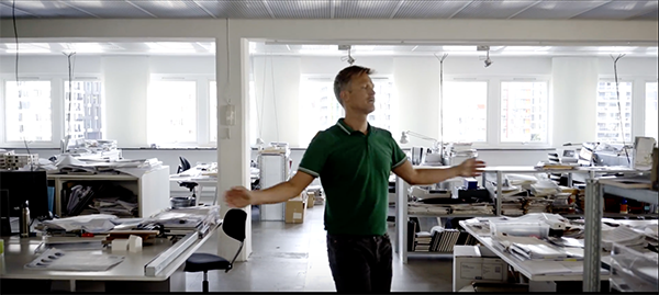 Dancer Geir Hytten dancing in a local architecture firm in the music video for Habit